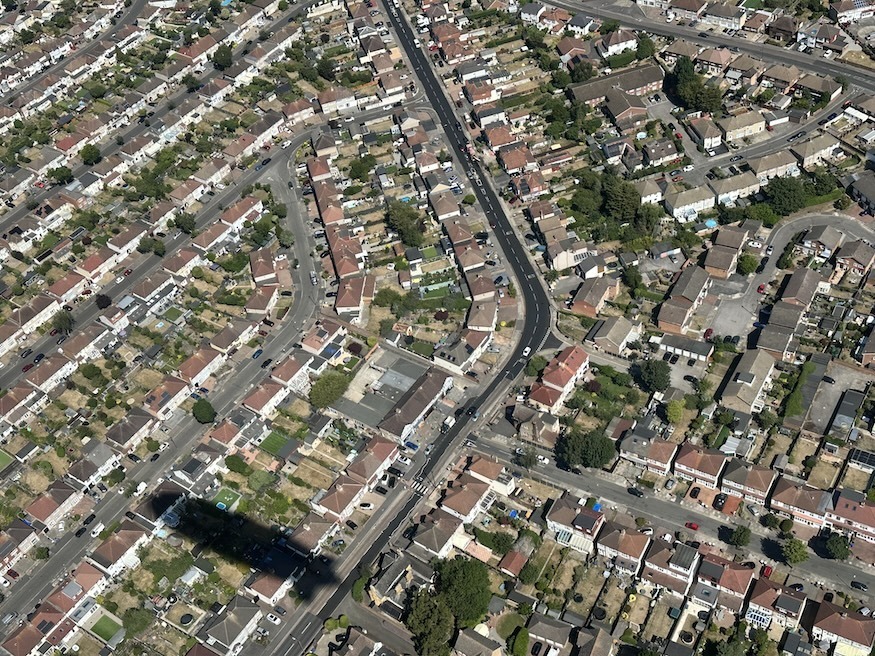 The shadow of the goodyear blimp over residential streets in bexleyheath