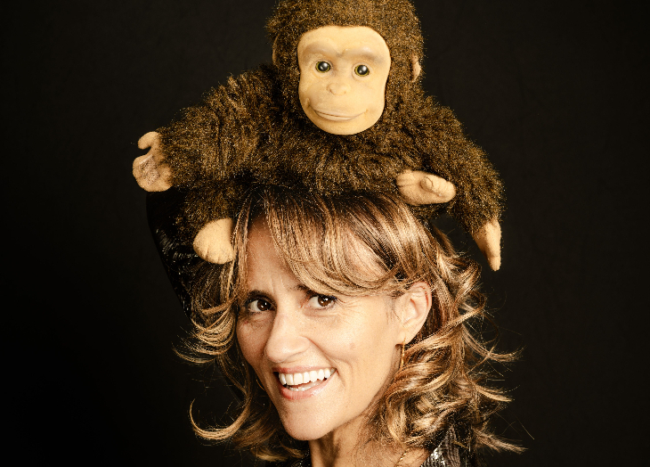 August 2026 in London: Nina Conti, with a stuffed toy monkey on her head