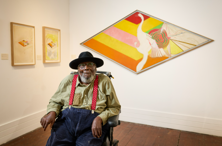 August 2026 in London: Frank Bowling in front of some of his artworks