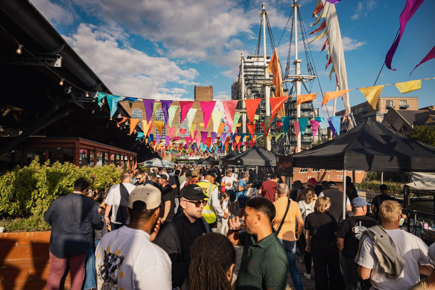 September 2026 things to do in London: People beneath colourful bunting at an open air food festival