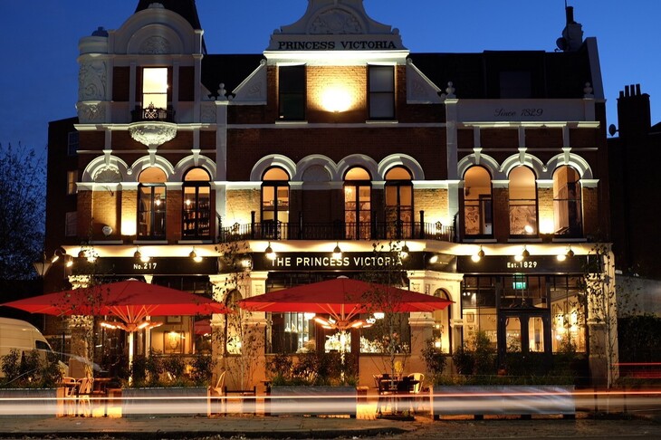 The front of the Princess Victoria pub at night