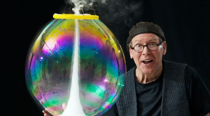 October 2026 half term in London: a man next to a gigantic bubble
