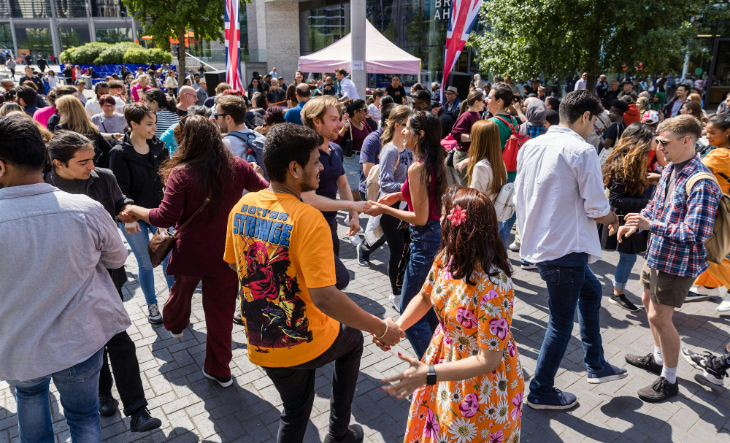 People dancing in the open air