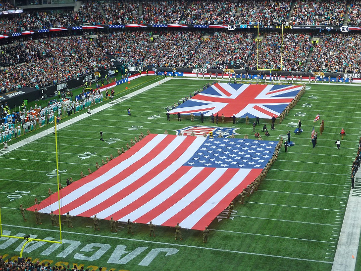NFL in London 2026: Huge UK and US flags on the pitch before a match