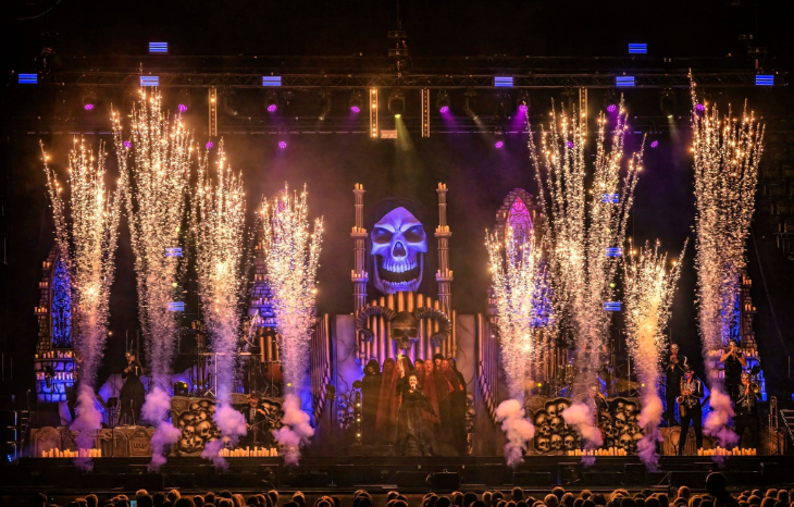 Things to do in London in October 2026: a singer performing on stage, with a large skull on the screen behind them, and pyrotechnics on either side