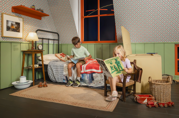 October 2026 half term in London: two children sitting in a bedroom reading