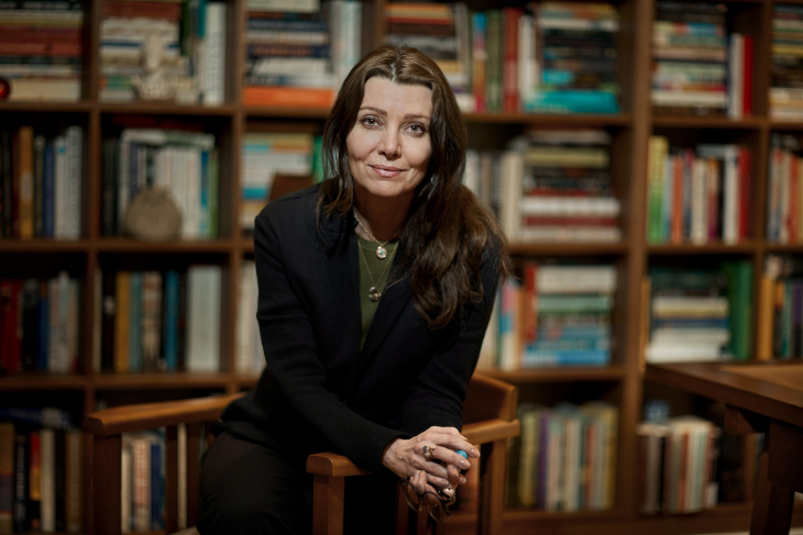 Things to do in London in October 2026: author photo of Elif Shafak, with a wall of bookshelves behind her