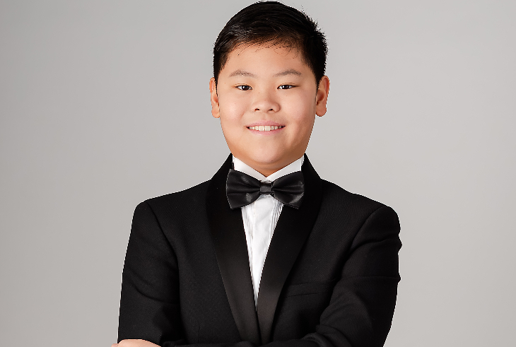 Things to do in London today: Carey Tan, a young boy dressed in black tux, white shirt and bow tie