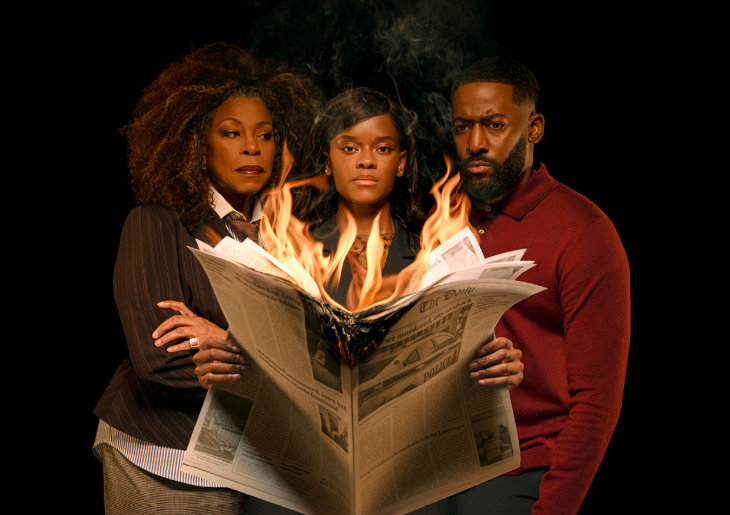 Things to do in London today: three people gathered around a burning newspaper in a promo photo for The Story
