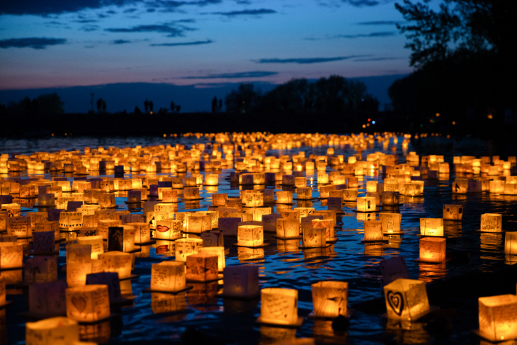 Things to do in London this weekend: dozens of illuminated cube-shaped lanterns floating on water