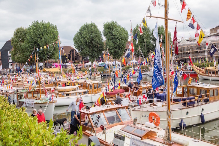 Things to do in London this weekend: classic boats moored up beneath colourful bunting