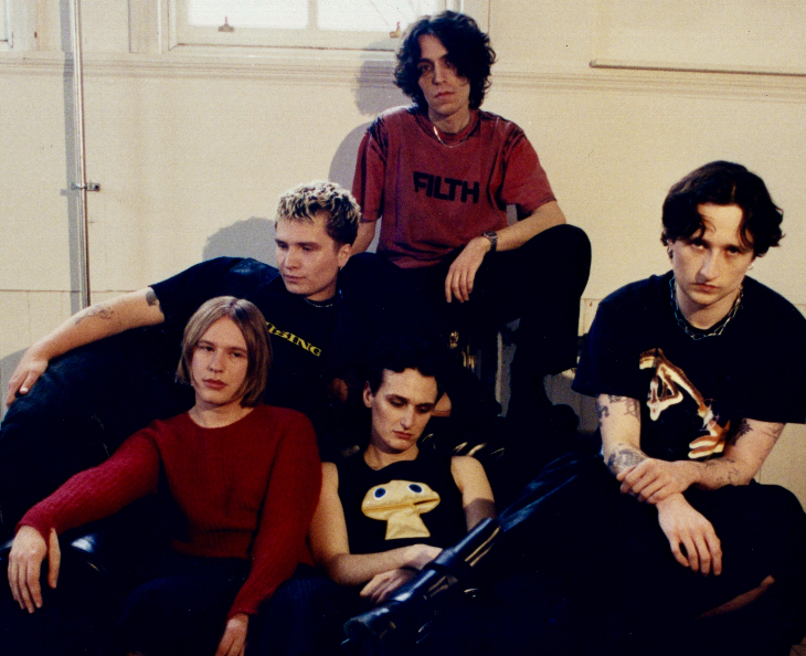 Things to do in London this weekend:  Five members of Walt Disco sitting on a sofa for a photo