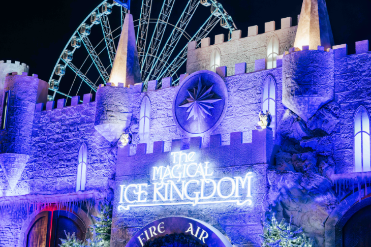 Hyde Park Winter Wonderland Christmas 2026 guide: a castle made from ice, with an illuminated "The Magical Ice Kingdom" sign on the front