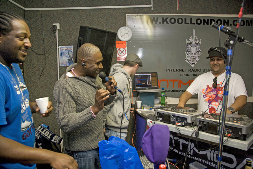 A group of DJs around the decks