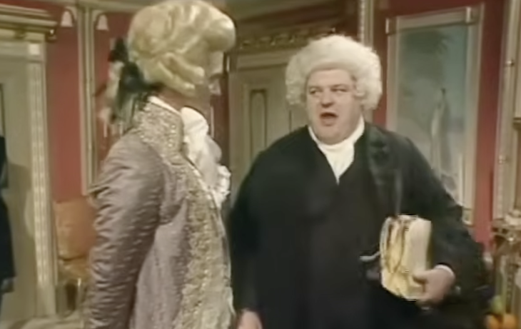 Robbie Coltrane as Dr Johnson, beside Hugh Laurie's Prince Regent