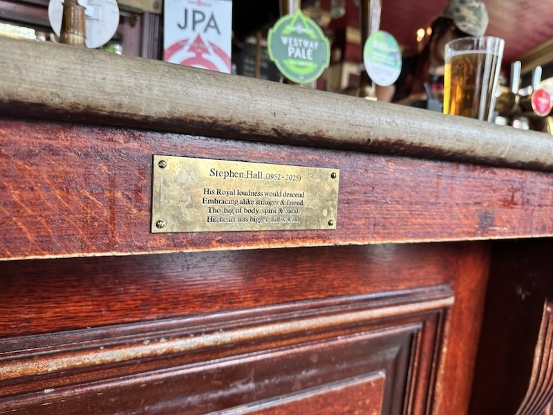 Tapping the Admiral pub plaque