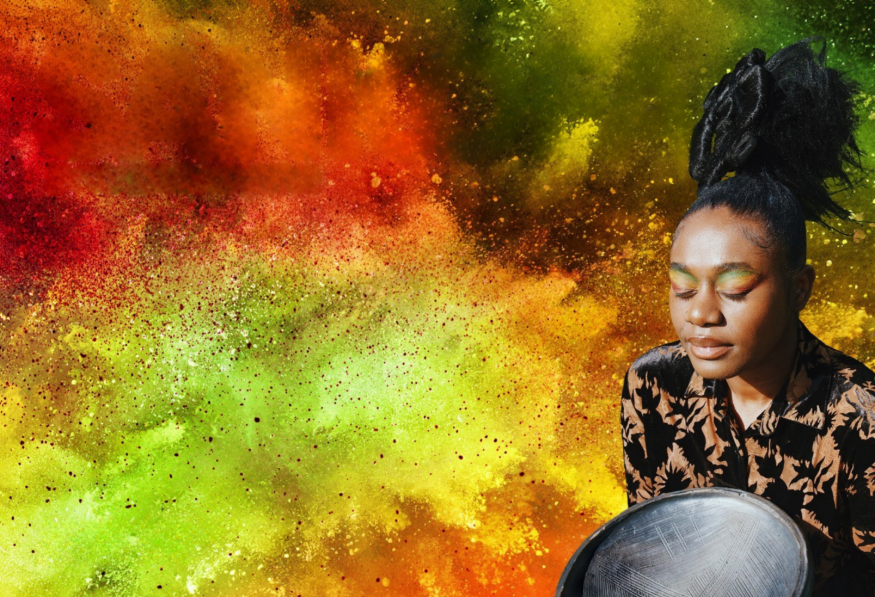 Things to do in London in October 2026: A photo of a woman with her eyes closed, against a backdrop of colourful paint flying around
