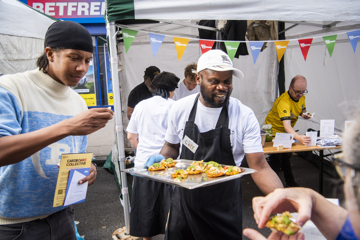 People serving up canapes