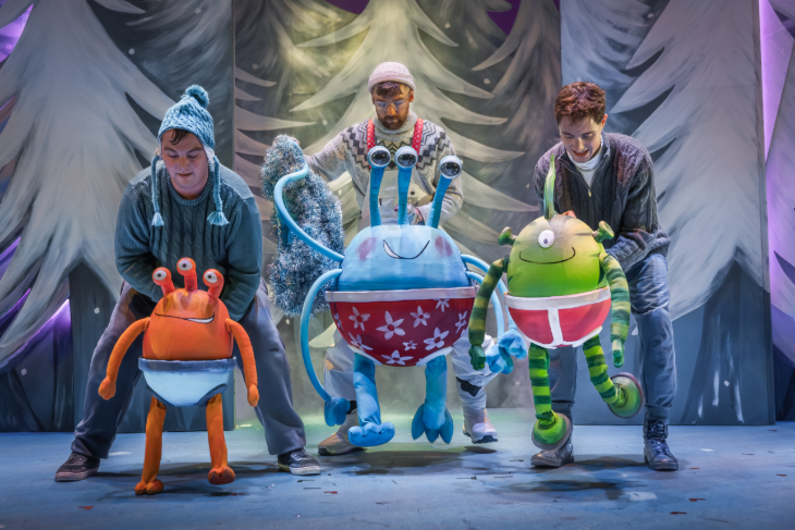Family Christmas theatre shows 2026: three actors on stage each operating a large alien puppet