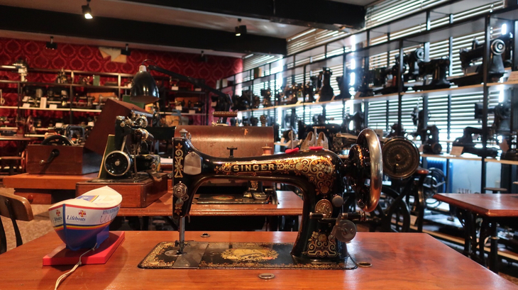 Sewing machines on display inside the Sewing Machine Museum