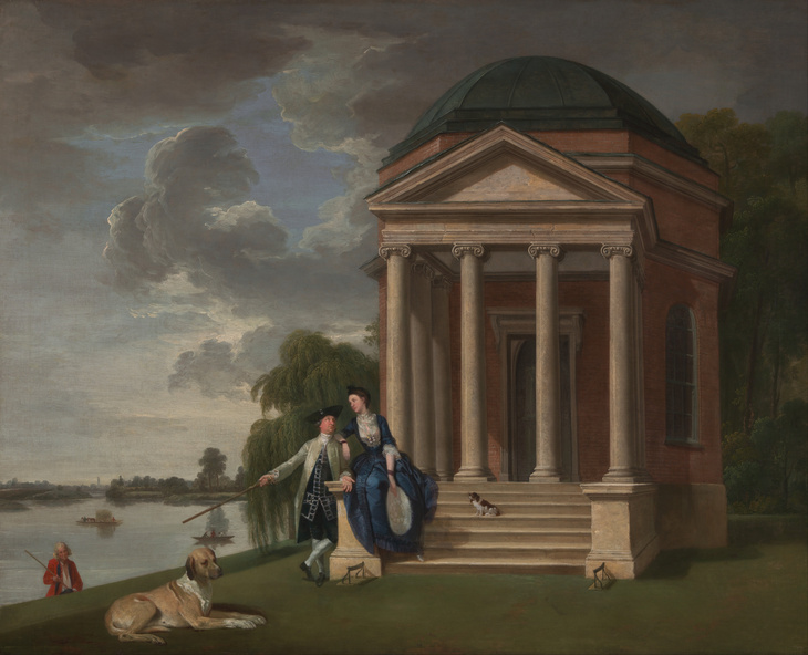 An 18th-century oil painting of a man and woman in elegant attire standing before a brick, domed garden temple with classical columns. They are positioned on a grassy riverbank under a dramatic, cloudy sky, accompanied by two dogs and a servant in the background.