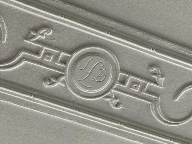 Waltham Forest town hall ceiling with pounds shilling and pence symbol