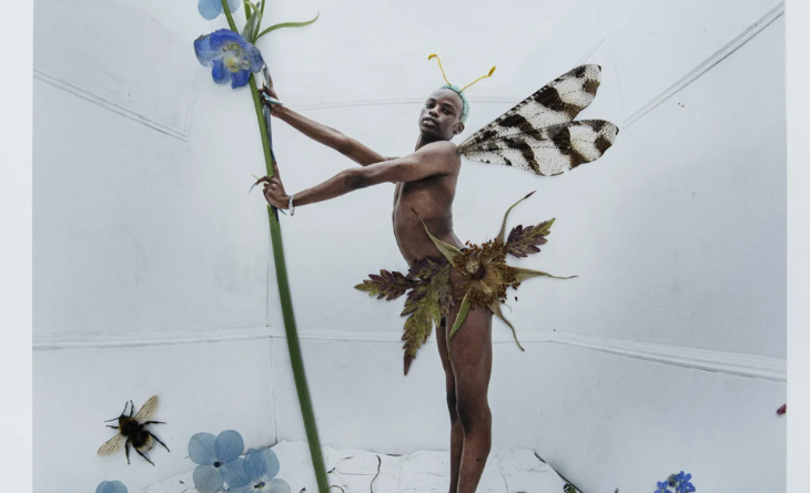 Things to do in London today: a photograph of a person posing as a fairy, with flower petals used as their wings and clothing