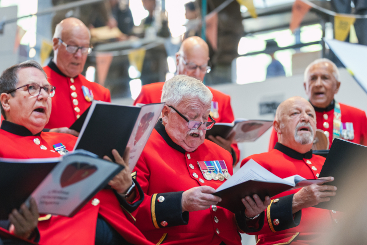 Things to do in London today: a choir consisting of Chelsea Pensioners in their red uniforms