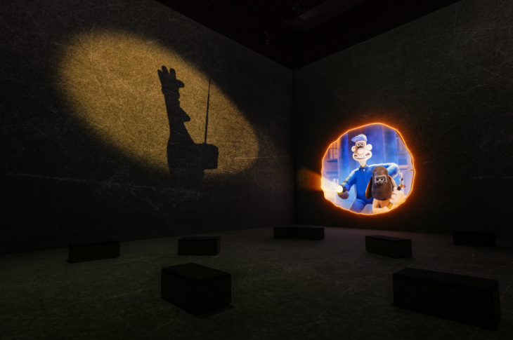 A scene from Wallace & Gromit projected onto a wall at Lightroom