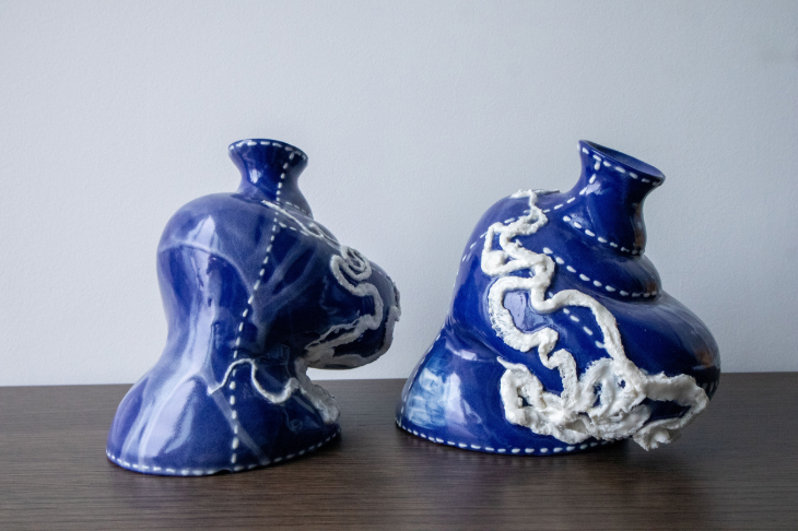 Things to do in London this weekend: two blue vases with white decor, designed to look misshapen