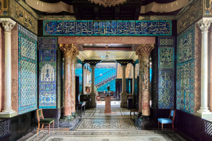Things to do in London today: an incredibly ornate hall, decorated with blue tiles and marble columns