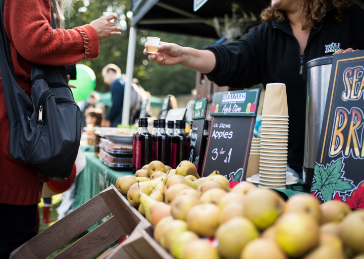 Things to do in London this weekend: an outdoor stall selling apples and apple juice