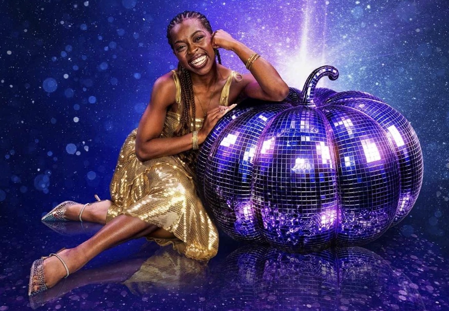Cinderella with a pumpkin disco ball