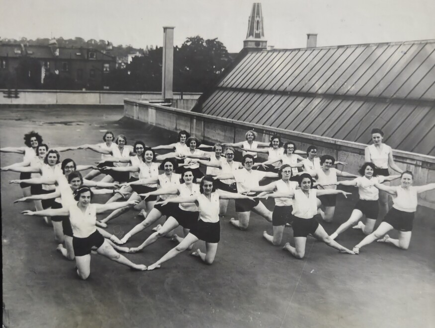 People exercising on the roof
