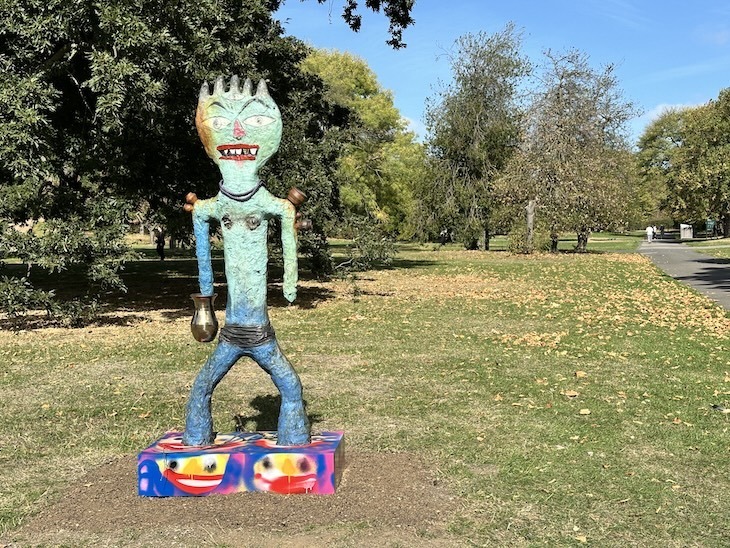 A colourful sculpture of a warrior