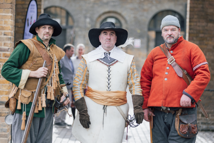 Things to do in London this weekend: three men in period  costume standing for a photo