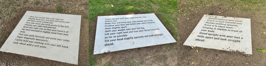 Three stones with descriptions on them