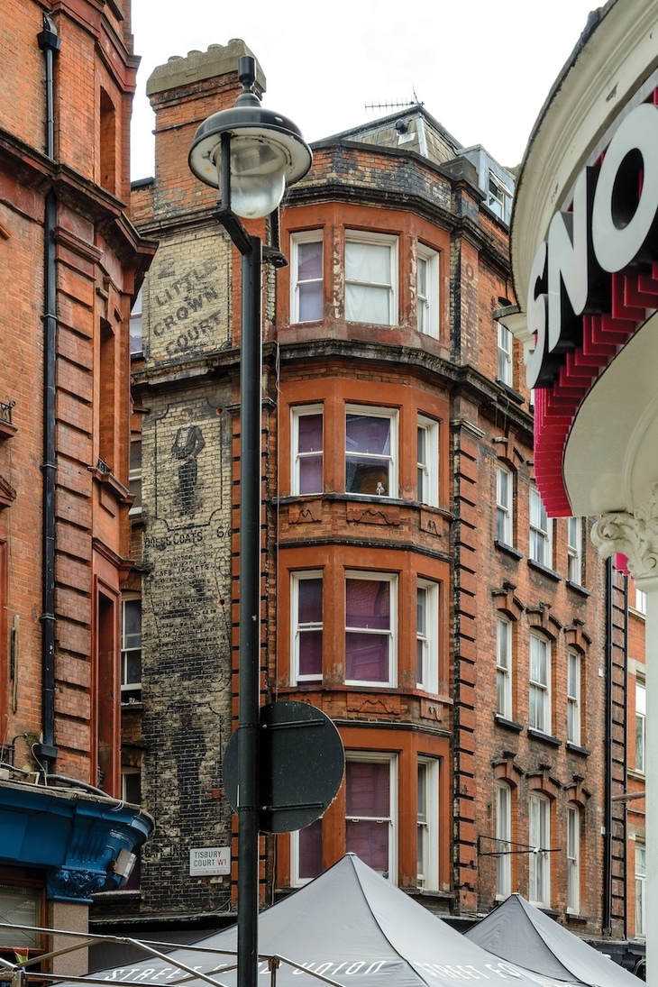 The ghost sign featuring man in a tux