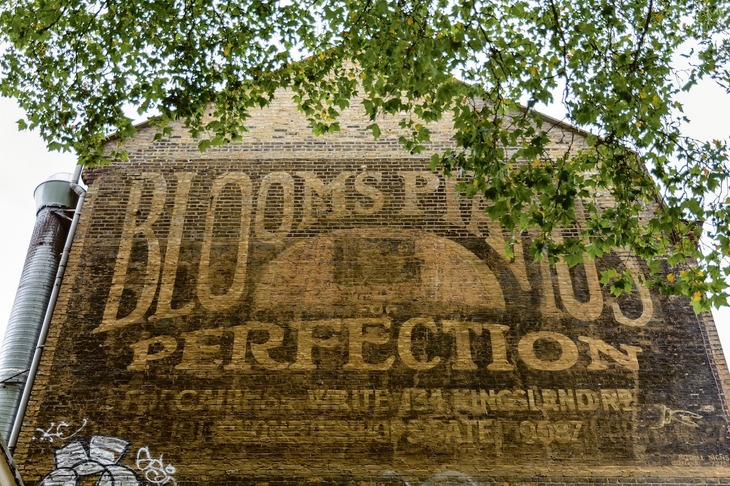 The Bloom's Pianos ghost sign