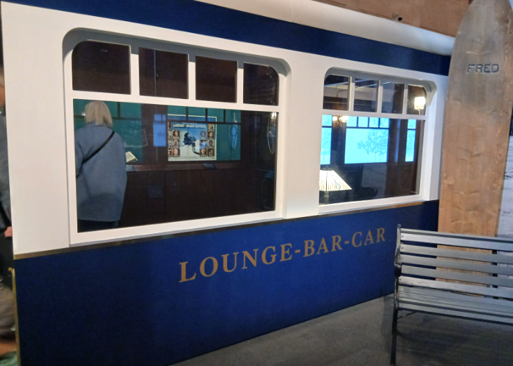 The exterior of a blue train carriage
