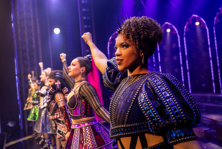 How to avoid Christmas in London: the six leading cast members of SIX lined up on stage in costume