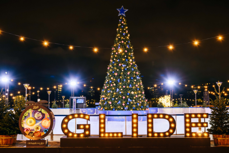 Christmas 2026 in London calendar: a Christmas tree in the centre of the Glide ice rink at Battersea Power Station