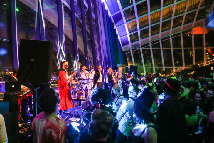 Halloween 2026 events London: a band performing live to a crowd in the Sky Garden at night