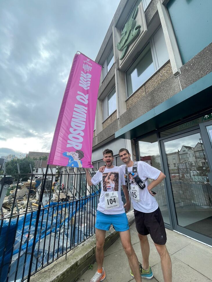 Two runners outside Zodiac Court