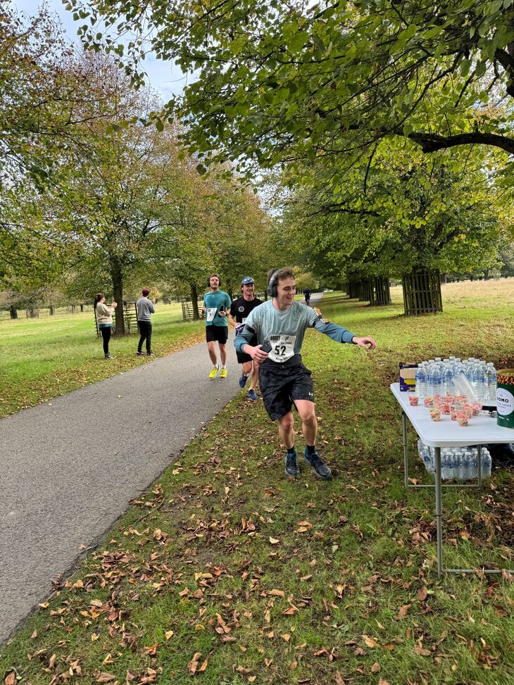 A runner picking up some refreshments
