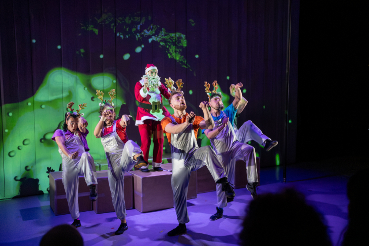 Santa dancing with reindeer