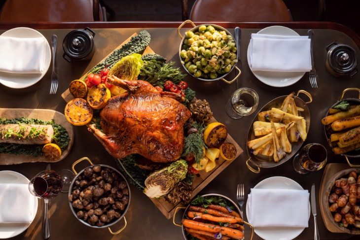 Thanksgiving 2026 events in London: a Thanksgiving feast, with a roast turkey at the centre