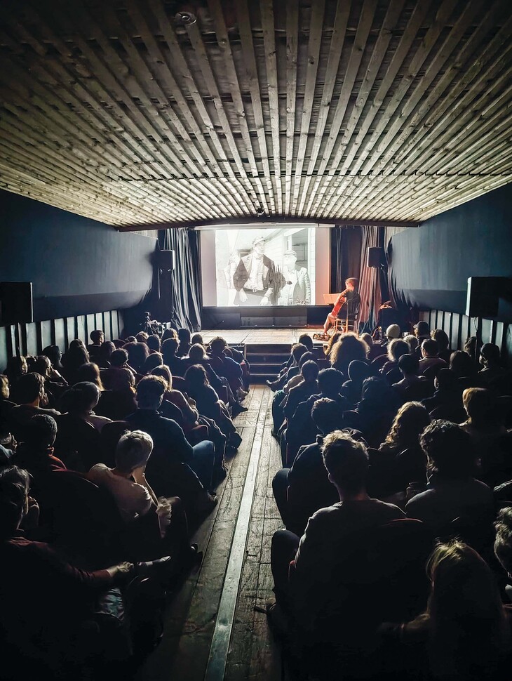 A packed cinema on a boat