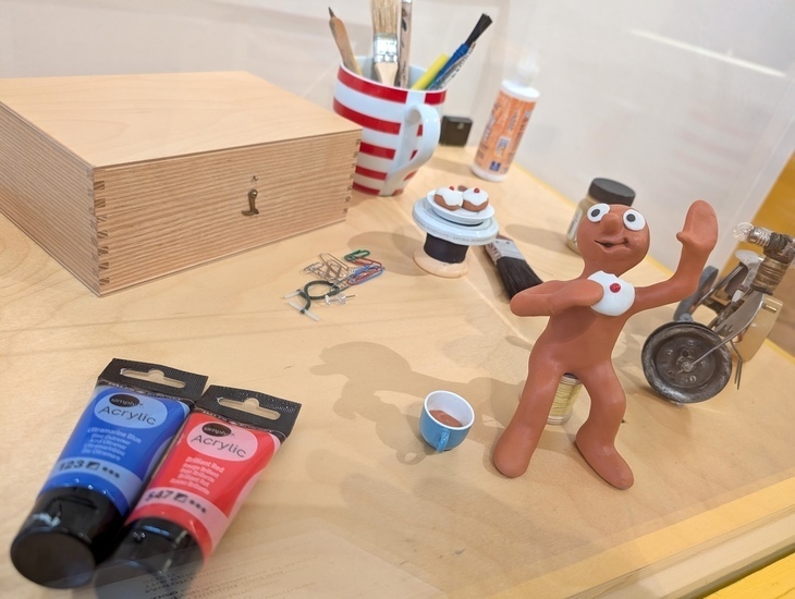 Things to do in London in November 2026: a model of Morph and some art supplies on a table