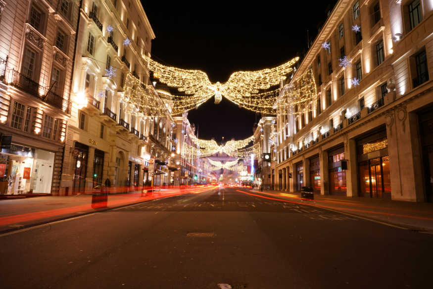 Things to do in London on Christmas Day 2026: angel Christmas lights above a deserted street 